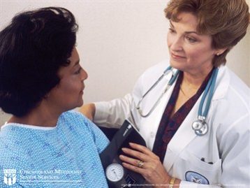 A patient consulting with her doctor