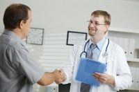 a doctor meets with a patient to discuss gout