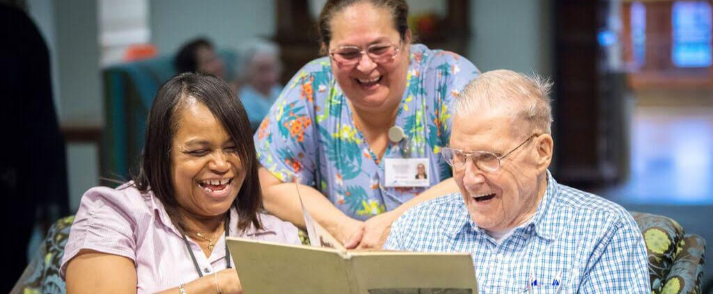 cmssfolks People reading book and enjoying the health benefits of laughter